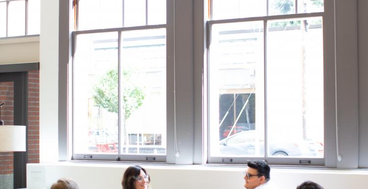 Group of four people in a room