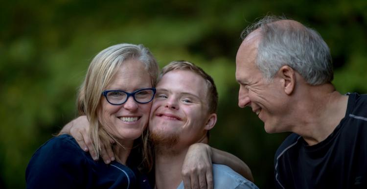 Parents and son with downs syndrome