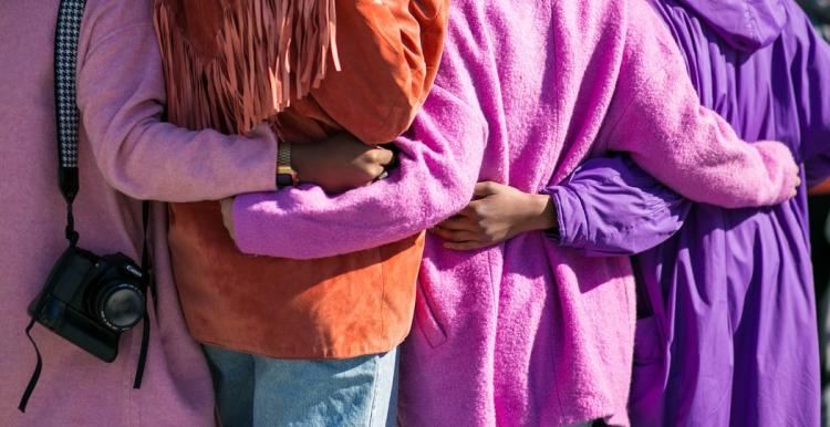 Close up of women embracing